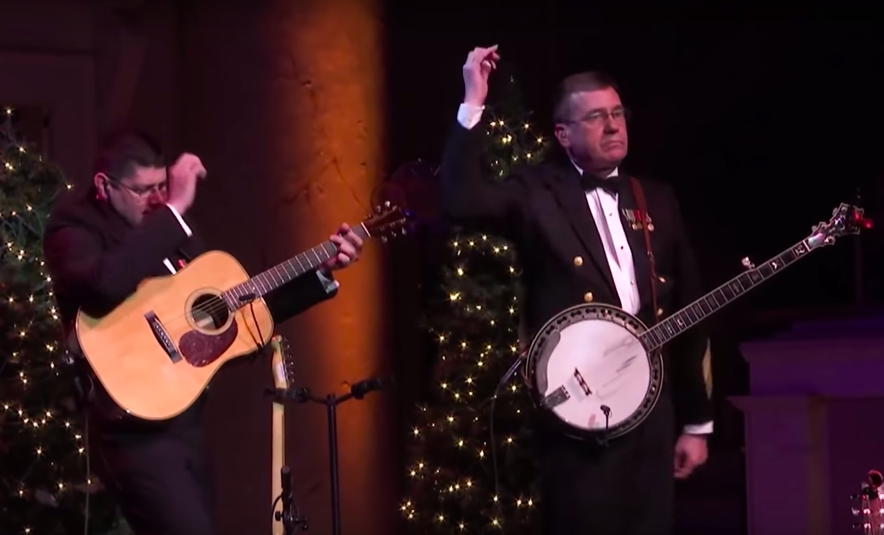 Two Navy Men Have Fun With Crowd Dueling “Jingle Bells”