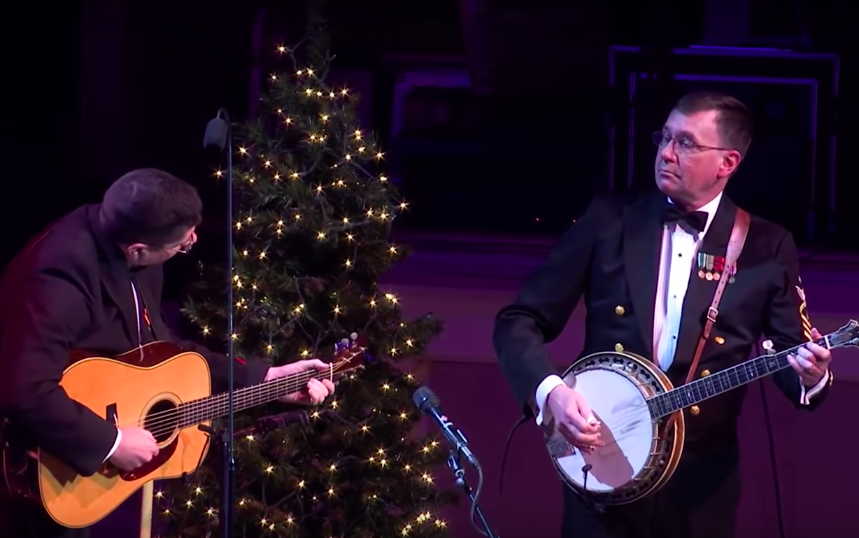 Two Navy Men Have Fun With Crowd Dueling “Jingle Bells”