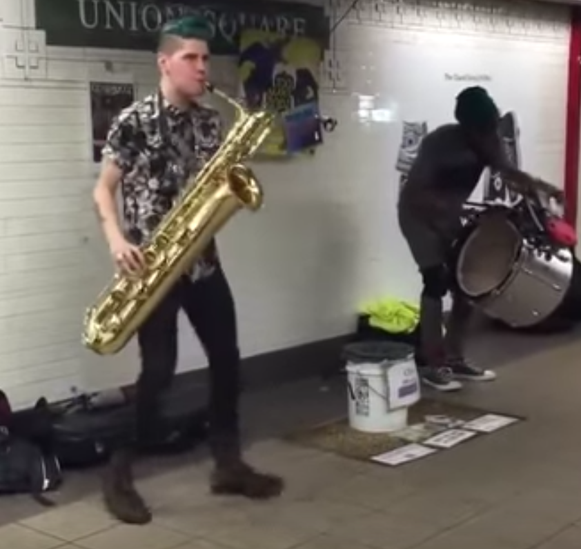 Buskers perform in NYC subway, but sax player’s dance moves and electro