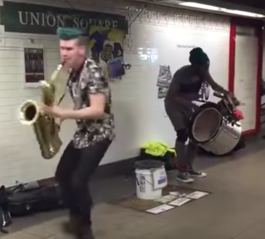 Buskers perform in NYC subway, but sax player’s dance moves and electro