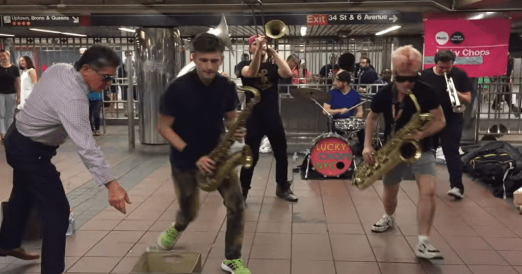 Talented brass band plays old school music and turns subway platform