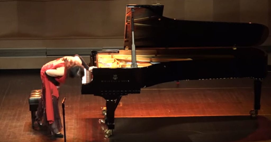 Piano has a broken pedal, but Brazilian pianist keeps playing the whole time they fix it