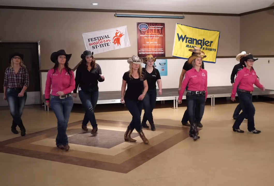 10 Cowgirls Light Up Room With Fun “Cotton Eye Joe” Dance