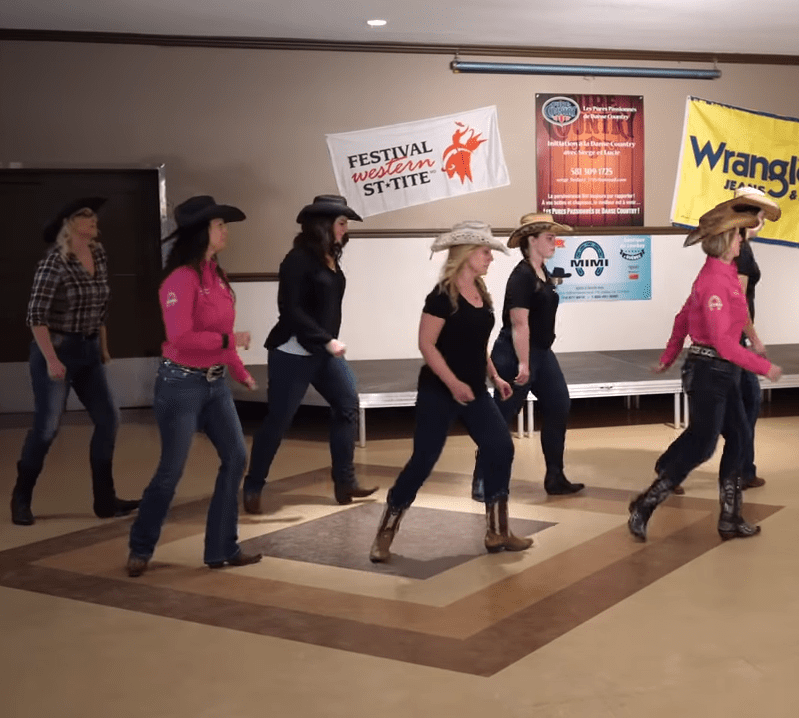 10 Cowgirls Light Up Room With Fun “Cotton Eye Joe” Dance