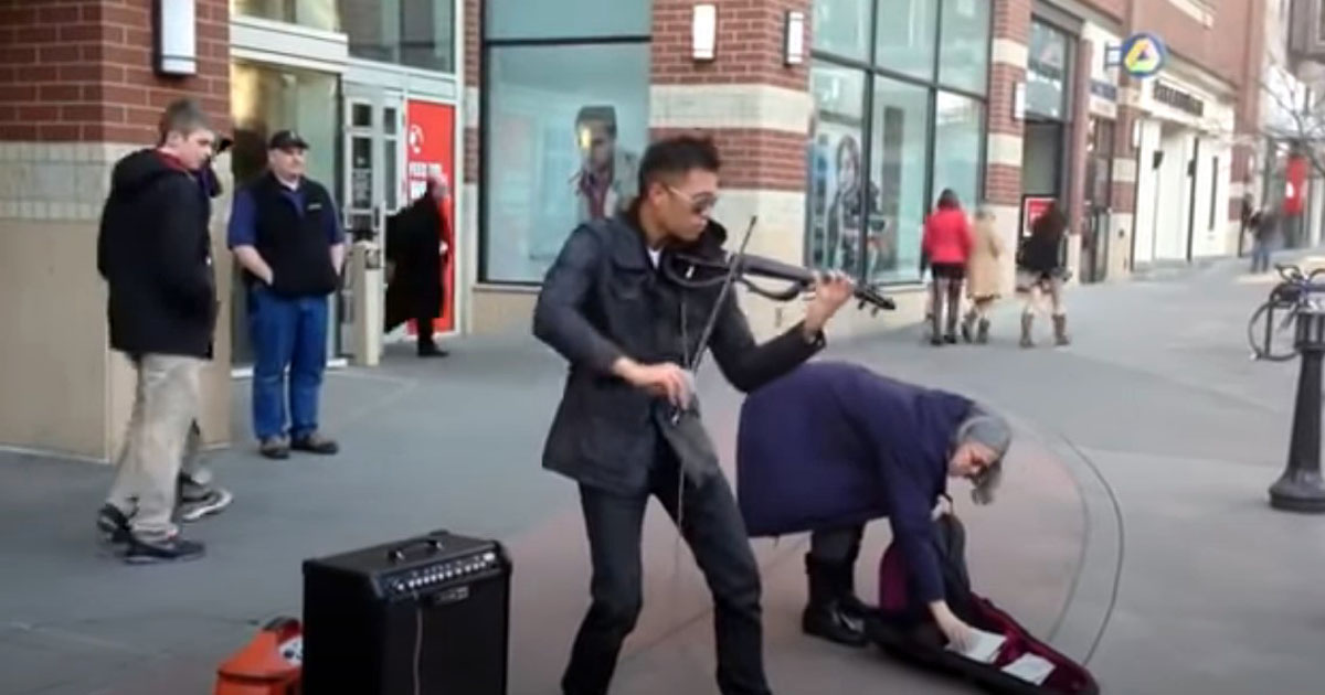 Incredible busker plays crisp electric violin medley and beatboxes at