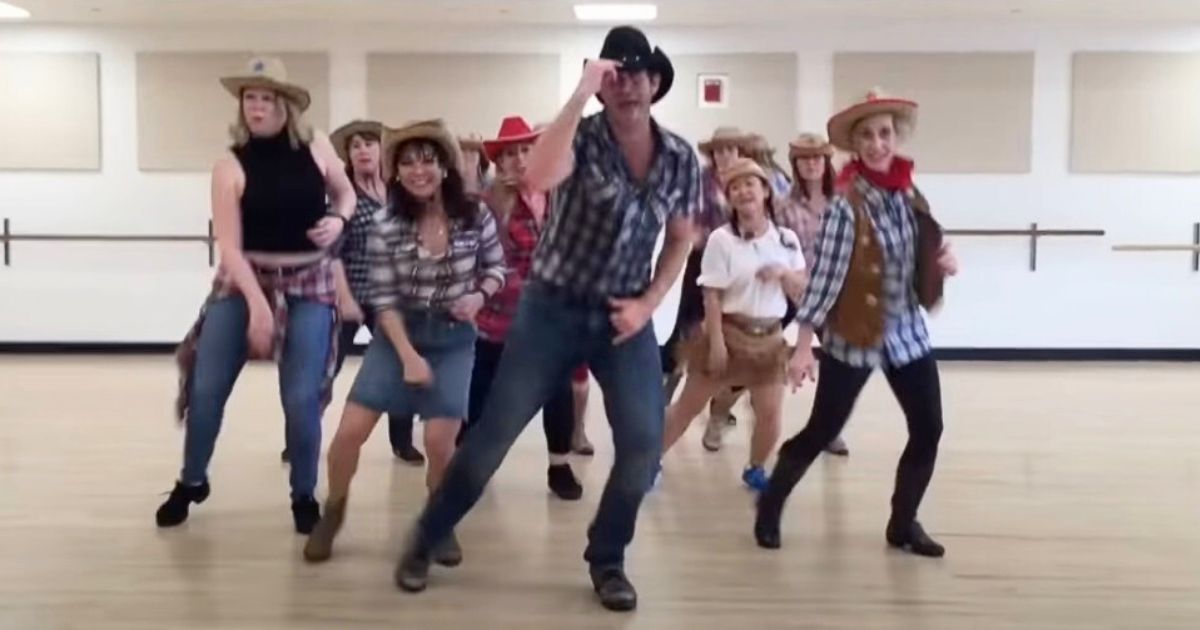 Handsome cowboy leads “Footloose” dance until Grandma steals spotlight